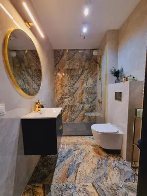 a bathroom with a sink and a toilet and a tub at Apartament Jacuzzi in Kraków