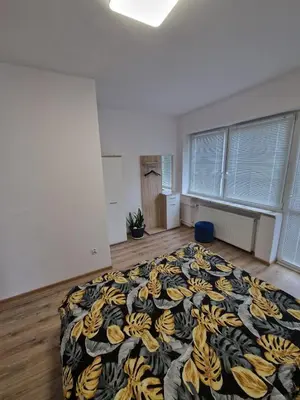 a bedroom with a bed with bananas on it at La Casa De Roland in Wieliczka