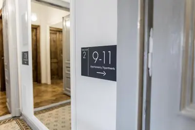 a sign on the door of a room at CracWoW K8 No.10 Apartment in Kraków