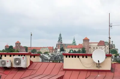a view from the roof of a building with satellites at Charming apartment in perfect location in Kraków
