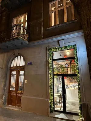 a building with a door with ivy on it at Apartment Family Dreams Old Town in Kraków