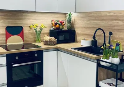 a kitchen with a sink and a counter top at MR HOME APARTMENTS - Nullo in Kraków
