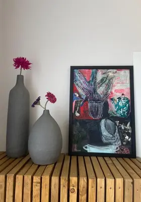 two vases sitting on a wooden shelf with a painting at MR HOME APARTMENTS - Nullo in Kraków