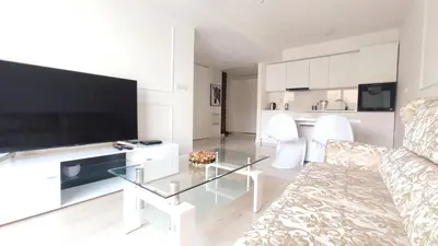 a living room with a couch and a glass table at Augustiańska 24 by Homeprime in Kraków