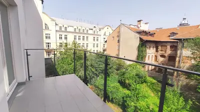 a balcony with a view of some buildings at Augustiańska 24 by Homeprime in Kraków