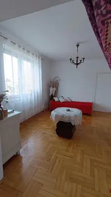 a kitchen with purple walls and a white refrigerator at Dom na szlaku Krakowskim in Łączany