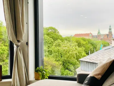 a window with a view of a city at PANORAMA VIEW by MINT APARTMENT in Kraków