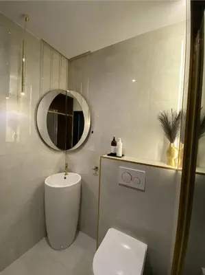 a white bathroom with a toilet and a mirror at Lux Stays by Torres at K39 Krakow in Kraków