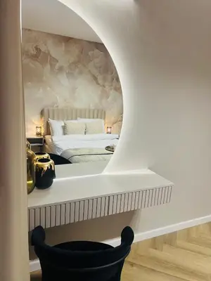 a bedroom with a bed with a wall mural at Crystal Luxury Apartment with Free Parking in Cracow for 4 Guests in Kraków