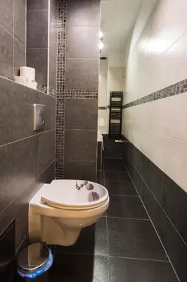 a bathroom with a toilet and a sink at Apartament przy Wawelu 80 m2 6 osób Kazimierz in Kraków