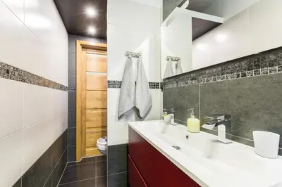 a bathroom with a sink and a toilet at Apartament przy Wawelu 80 m2 6 osób Kazimierz in Kraków