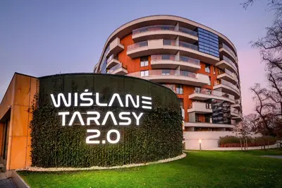 a building with a sign that reads wyssamine tasy at Beautiful Apartment- FREE GARAGE- WIŚLANE TARASY in Kraków