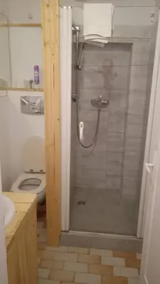 a shower in a bathroom with a toilet at Królówka in Maków Podhalański