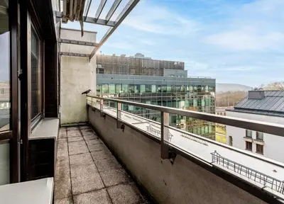 a balcony with a view of a building at Lea Cosy Apartment by BookingHost in Kraków