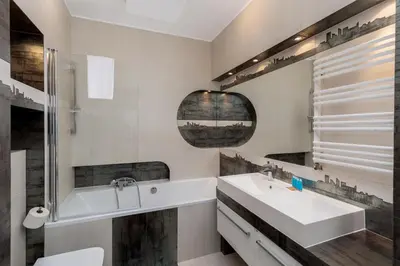 a white bathroom with a sink and a tub at Lea Cosy Apartment by BookingHost in Kraków
