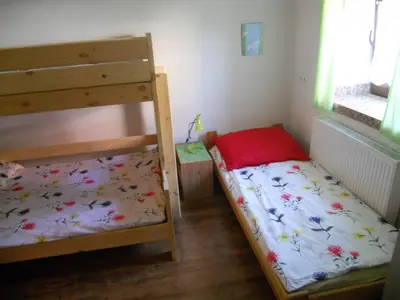 a bedroom with two bunk beds in a room at Dwór w Boleniu in Bolen