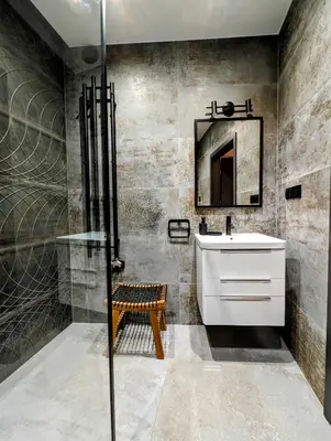 a bathroom with a sink and a mirror at Stachowicza 5 by Homeprime in Kraków