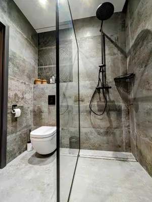 a bathroom with a shower and a toilet at Stachowicza 5 by Homeprime in Kraków