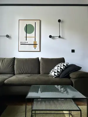 a living room with a couch and a coffee table at Composition No. 2 in Kraków
