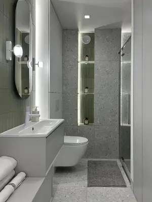 a bathroom with a sink and a toilet and a shower at Composition No. 2 in Kraków