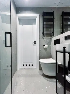 a bathroom with a tub and a toilet and a sink at Composition 23 with blue circle in Kraków