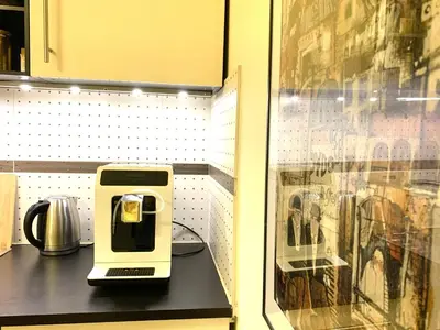 a toaster sitting on a counter in a kitchen at Apartament S19 in Kraków