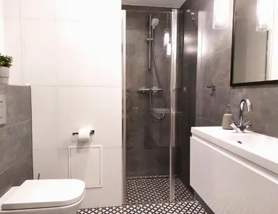 a bathroom with a shower and a toilet and a sink at VIVA LILA Apartment, FREE PARKING, close to Vistula River - by Homelike Krakow in Kraków