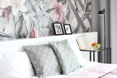 a bedroom with a bed with a flower wallpaper at VIVA GREEN & NATUR Apt close to Vistula River - by Homelike Krakow in Kraków