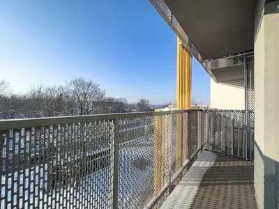 a balcony of a building with a fence at Apartament Filmowej Magii w centrum Krakowa in Kraków