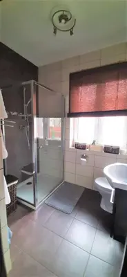 a bathroom with a shower and a toilet and a sink at House between Cracow and Wieliczka in Wieliczka