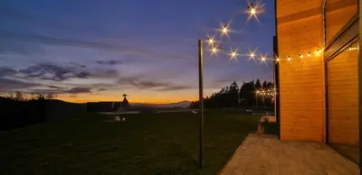 a group of lights on a building at night at Bocianie Gniazdo w Rabce in Rabka-Zdroj