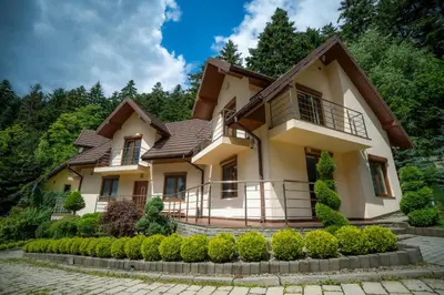 a house with a gambrel roof at Willa Łysa Góra Limanowa in Limanowa