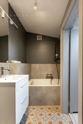 a bathroom with a tub and a sink at Spacious apartment 11 PAX, Vistula River - Fragola Apartments in Kraków