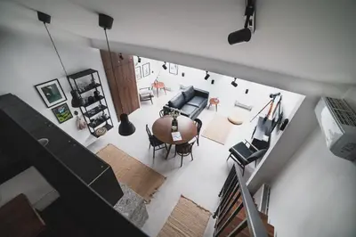 an overhead view of a living room with a table at Vitrum Apartments in Kraków