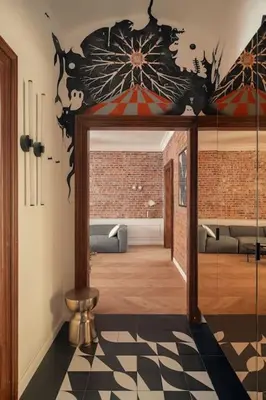 a room with a hallway with a hall way at Austin Flowers Old Town by WillyWalls in Kraków