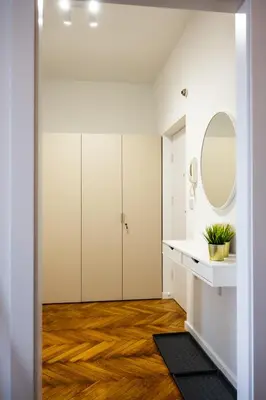a bathroom with a sink and a mirror at Sunny Corner in Kraków
