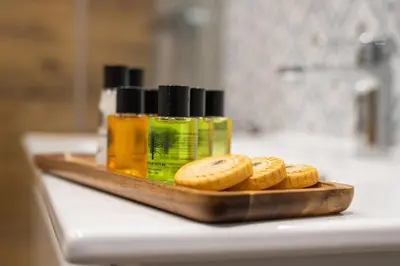 a group of four cookies on a cutting board on a counter at Sunny Corner in Kraków