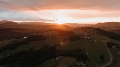 an aerial view of a sunset in the mountains at Dream Catcher House - dom do wynajęcia w górach in Limanowa