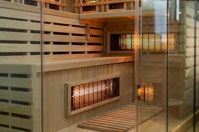 a building with a fireplace in a room at SPA bedrooms with Sauna&Bath and Free Parking in Kraków