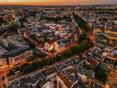 an aerial view of a city at night at D21 Art Loft Apartment in Kraków