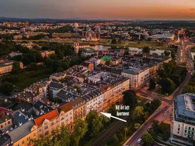 an aerial view of a city at dusk at D21 Art Loft Apartment in Kraków
