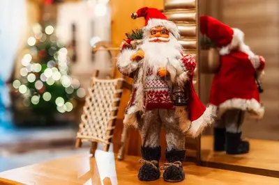 a figurine of santa claus standing on a table at Leśny Zakątek Jurków in Jurków