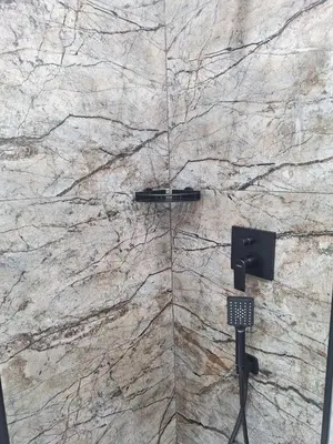 a stone wall with a microphone in a bathroom at Cozy studio with Air Conditioning for couples, Old Town - Jewish District in Kraków