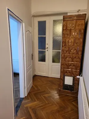 a hallway with a room with a door and a mirror at Agnieszki Pokoj nr 2 in Kraków