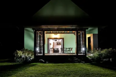 a view of a house at night at Apartament Zielona Willa in Skomielna Biała