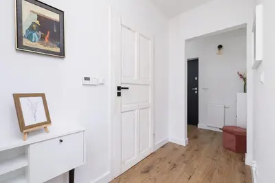 a room with white walls and a white door at Apartment in Krakow with parking and balcony by Noclegi Renters in Modlnica
