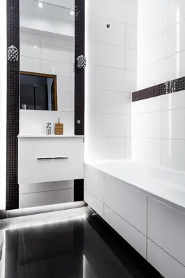 a white bathroom with a tub and a sink at Househost Apartment: Józefa 2/10 in Kraków