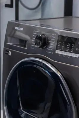 a close up of a washing machine at Unique Apartment with Balcony & Parking Zabłocie Cracow by Renters Prestige in Kraków