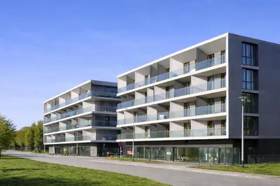 a living room with a couch and a table at InPoint Modern Apartment Lema 17-Tauron Arena & Free Parking Self Check-in in Kraków