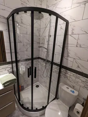a bathroom with a shower and a toilet in it at Apartment A1 in Downtown of Krakow in Kraków